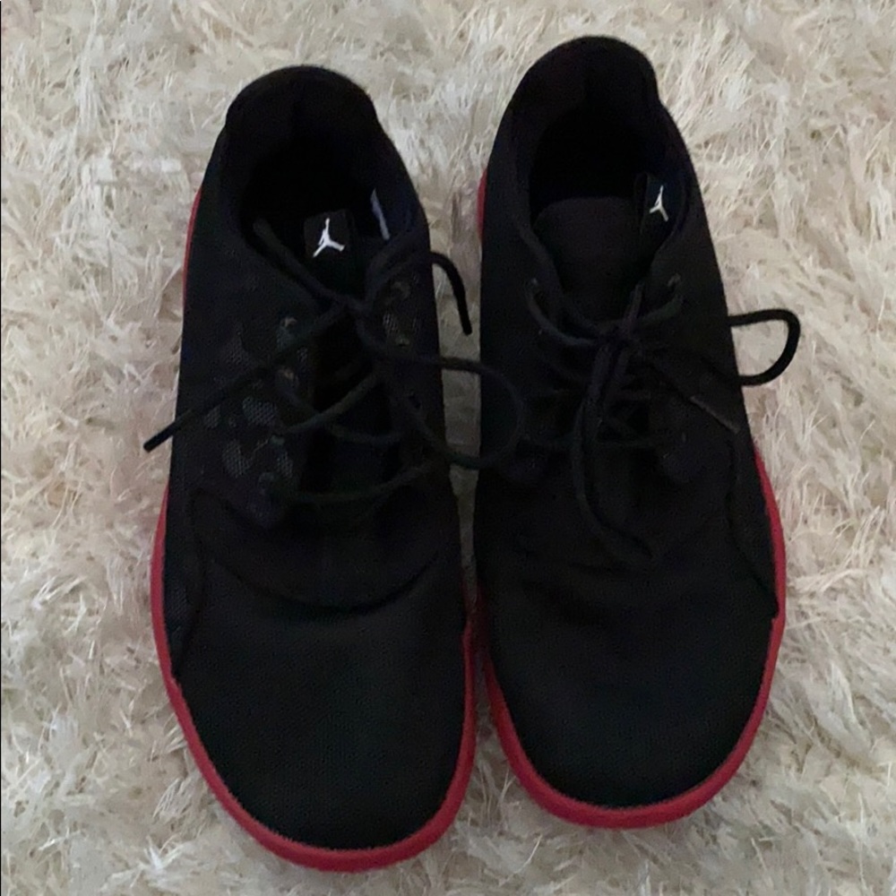 RED AND BLACK JORDANS